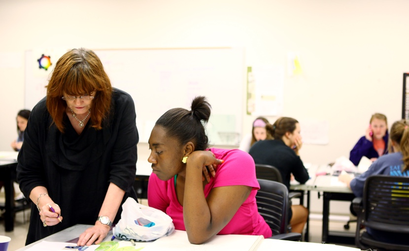 Teacher and student in classroom Classroom