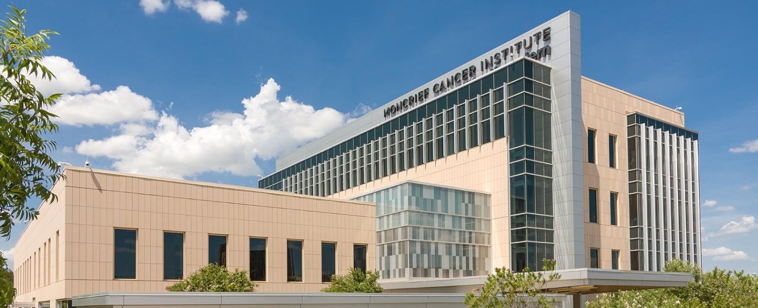Exterior of Moncrief Cancer Institute in Fort Worth, where TCU Art Galleries presents the Layers of Becoming exhibition.