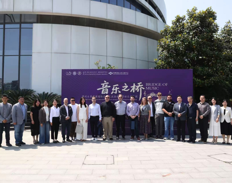 BrasTCU Faculty Brass Quintet with Dr. Tang Rong, Dean of The School of Music, and other faculty members at Soochow University, following the opening ceremony.s Faculty in China