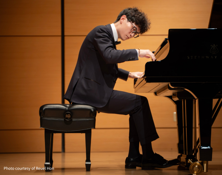 Chonglin Xu playing the piano