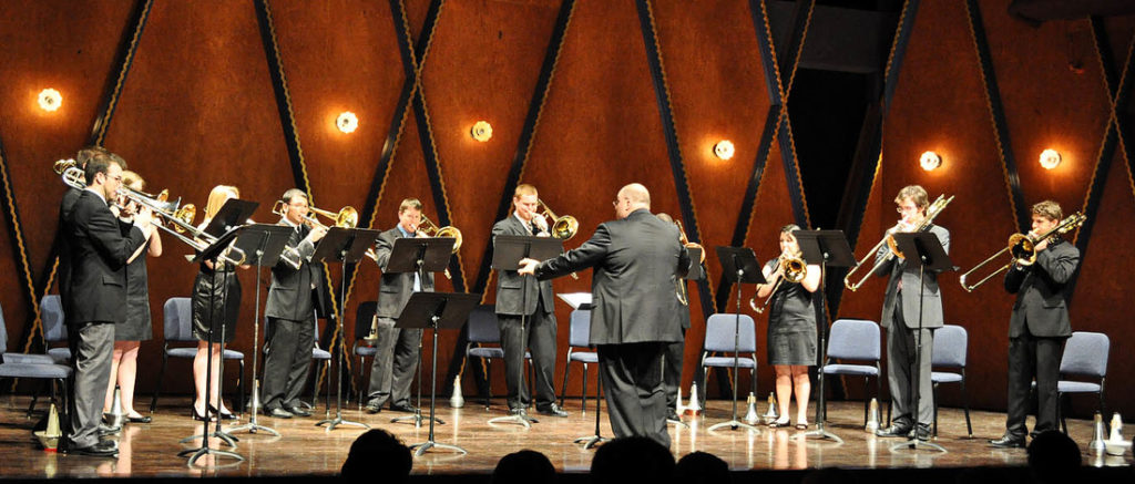 Trombone choir playing in PepsiCo Recital Hall