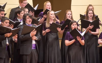 Students singing in a choir
