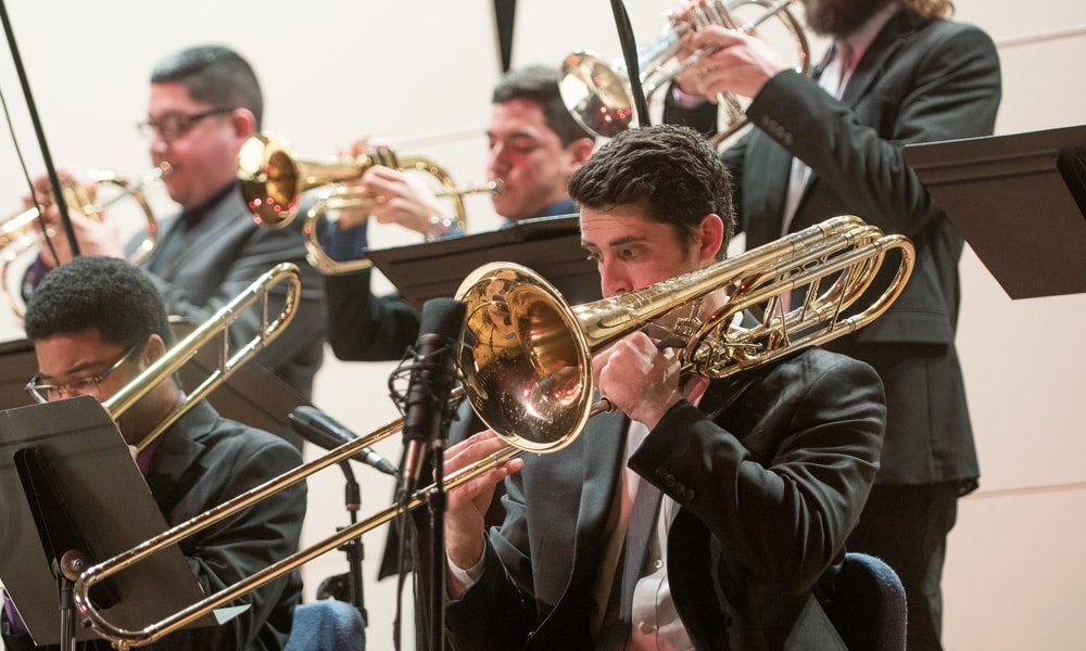 Student playing an instrument