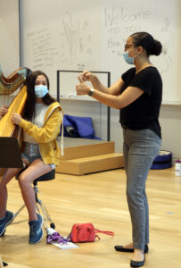 Dr. McHenry teaching a student at the TCU Summer Harp Workshop