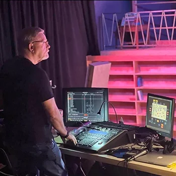 Skinner at the lighting console