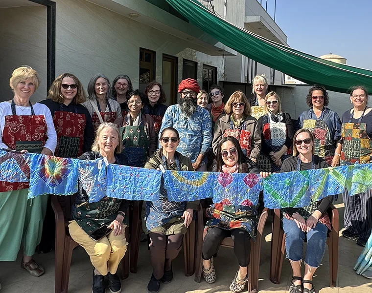 eddy and fellow group members participate in a Bandhani workshop in Jodhpur, exploring the tie-dyeing technique that involves intricately tying fabric with thread before dyeing.