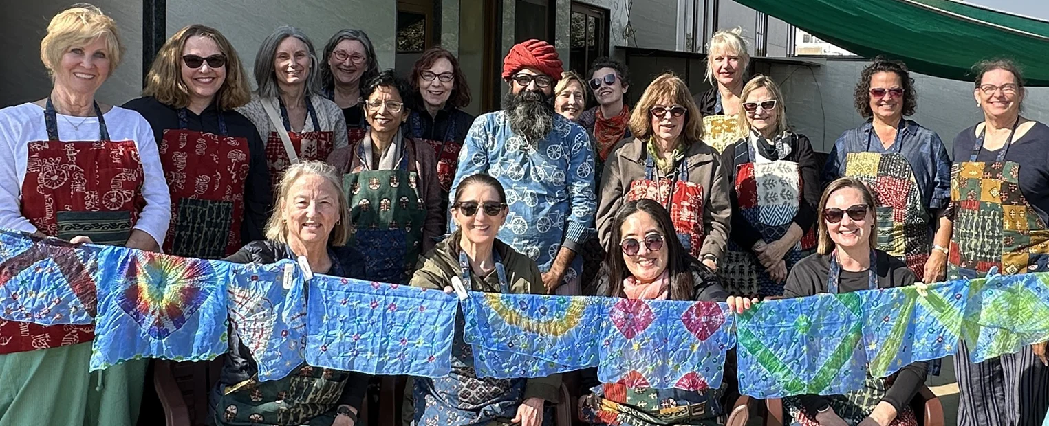 eddy and fellow group members participate in a Bandhani workshop in Jodhpur, exploring the tie-dyeing technique that involves intricately tying fabric with thread before dyeing.