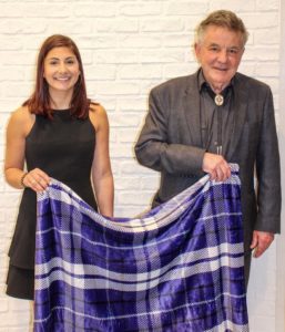 Aimee Hibler and Provost Nowell Donovan with a purple and white tartan design