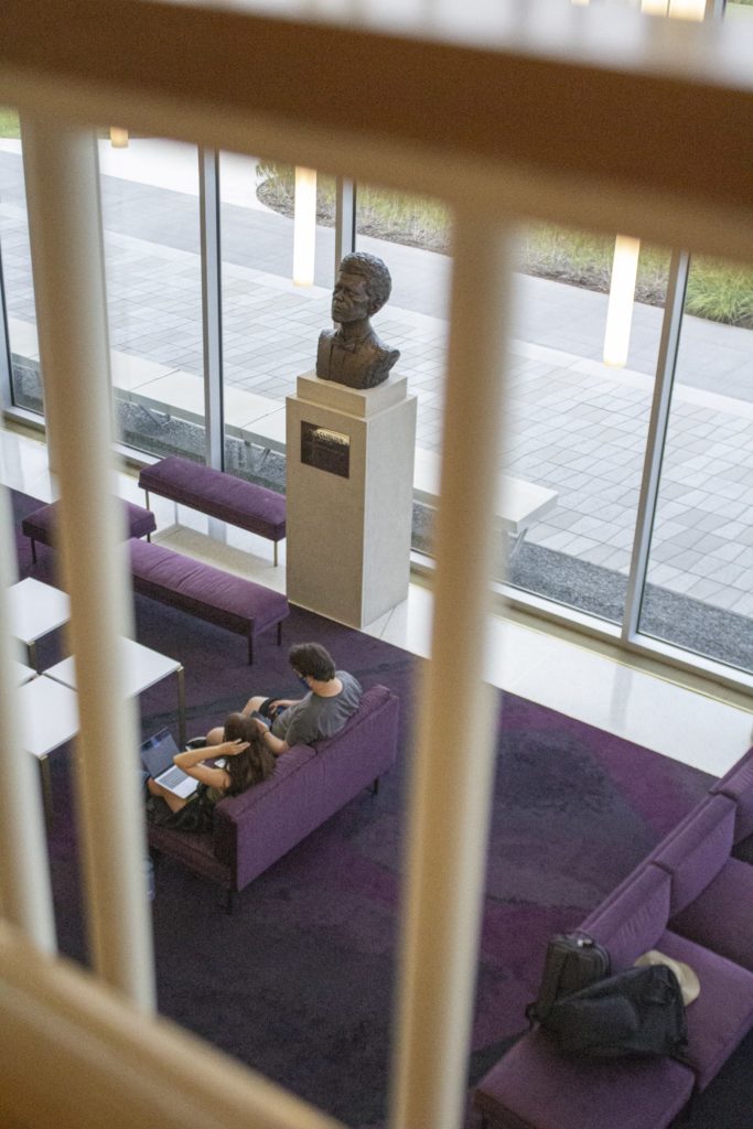 Students studying in the TCU Music Center lobby