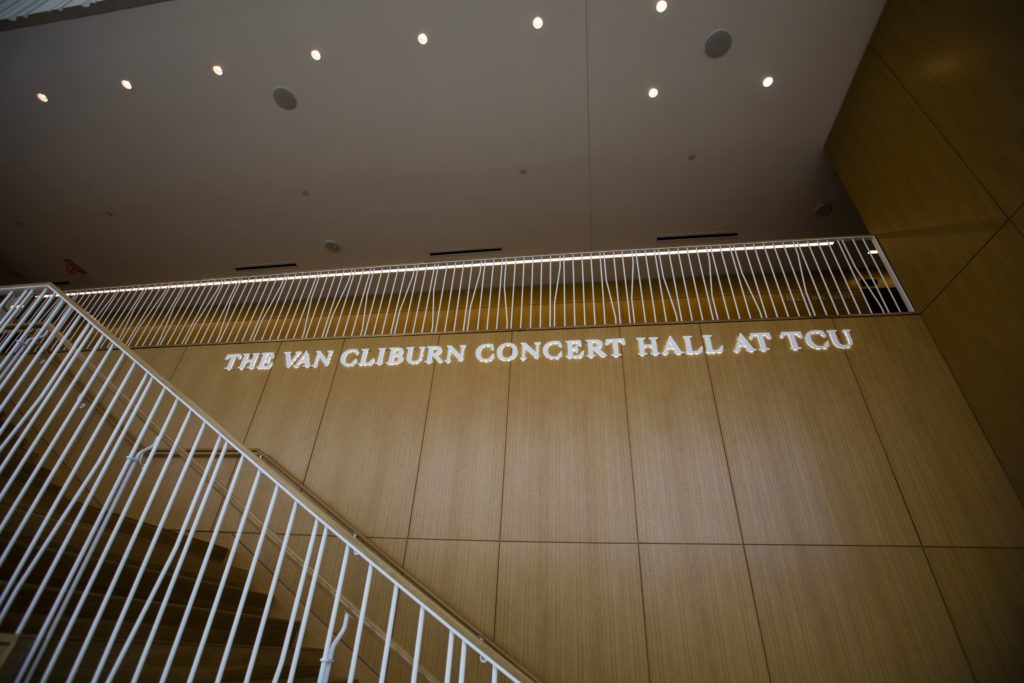 An upward shot of the Van Cliburn Concert Hall at TCU sign