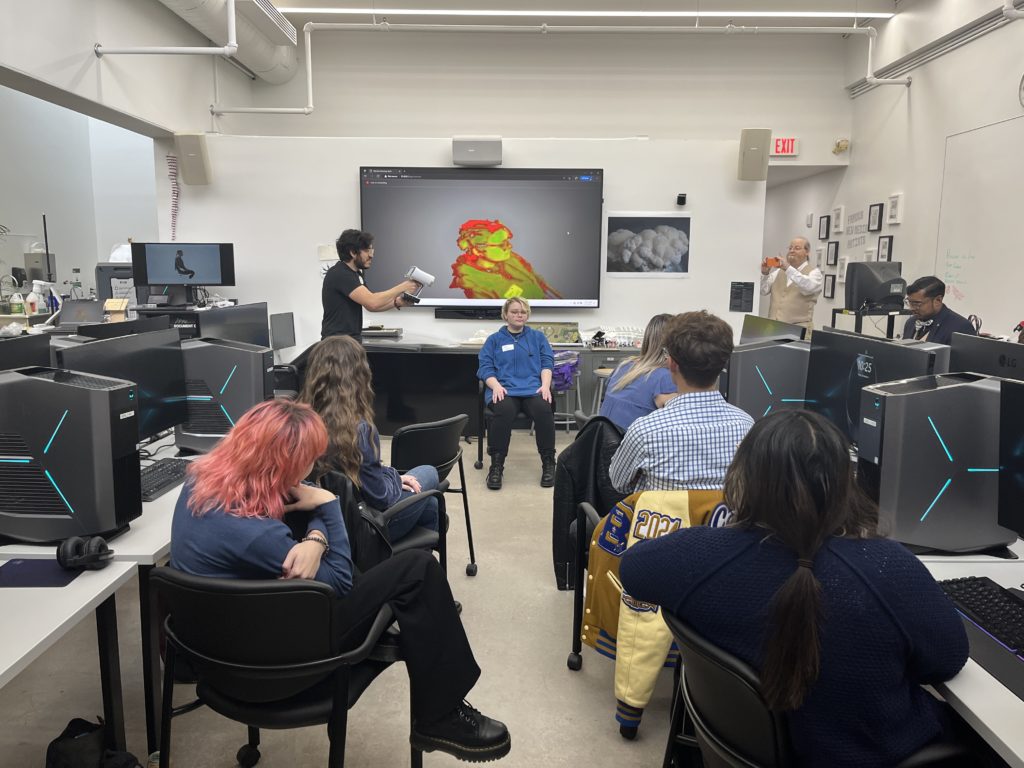 Associate Professor of New Media Art Nick Bontrager presenting non-traditional art techniques to students.