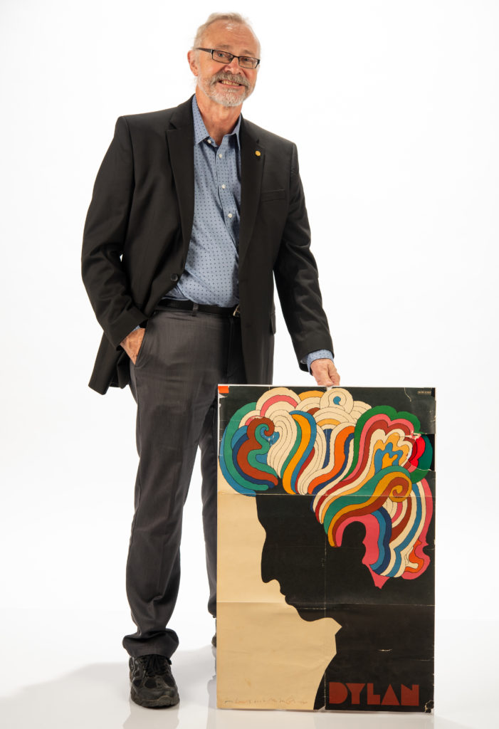 Lewis Glaser, professor and chair of the Department of Design with illustration of Bob Dylan.