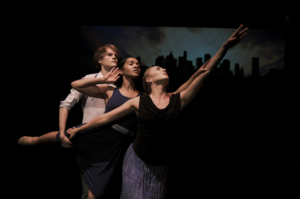 Three dancers performing on stage in "Sh'ma"