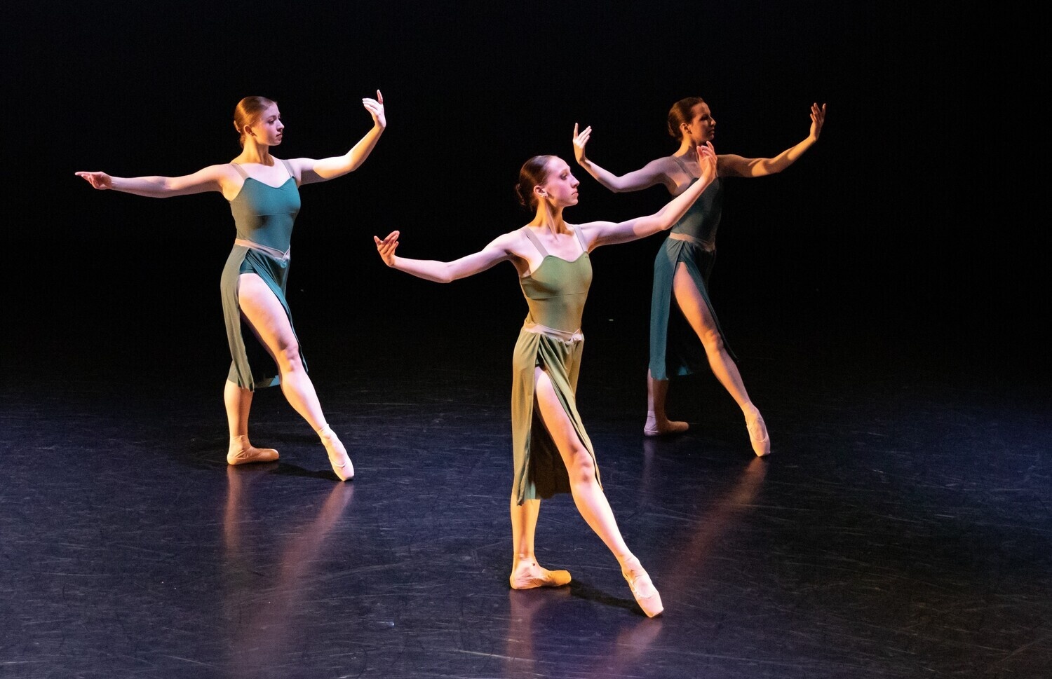 Image of three dancers n stage. 