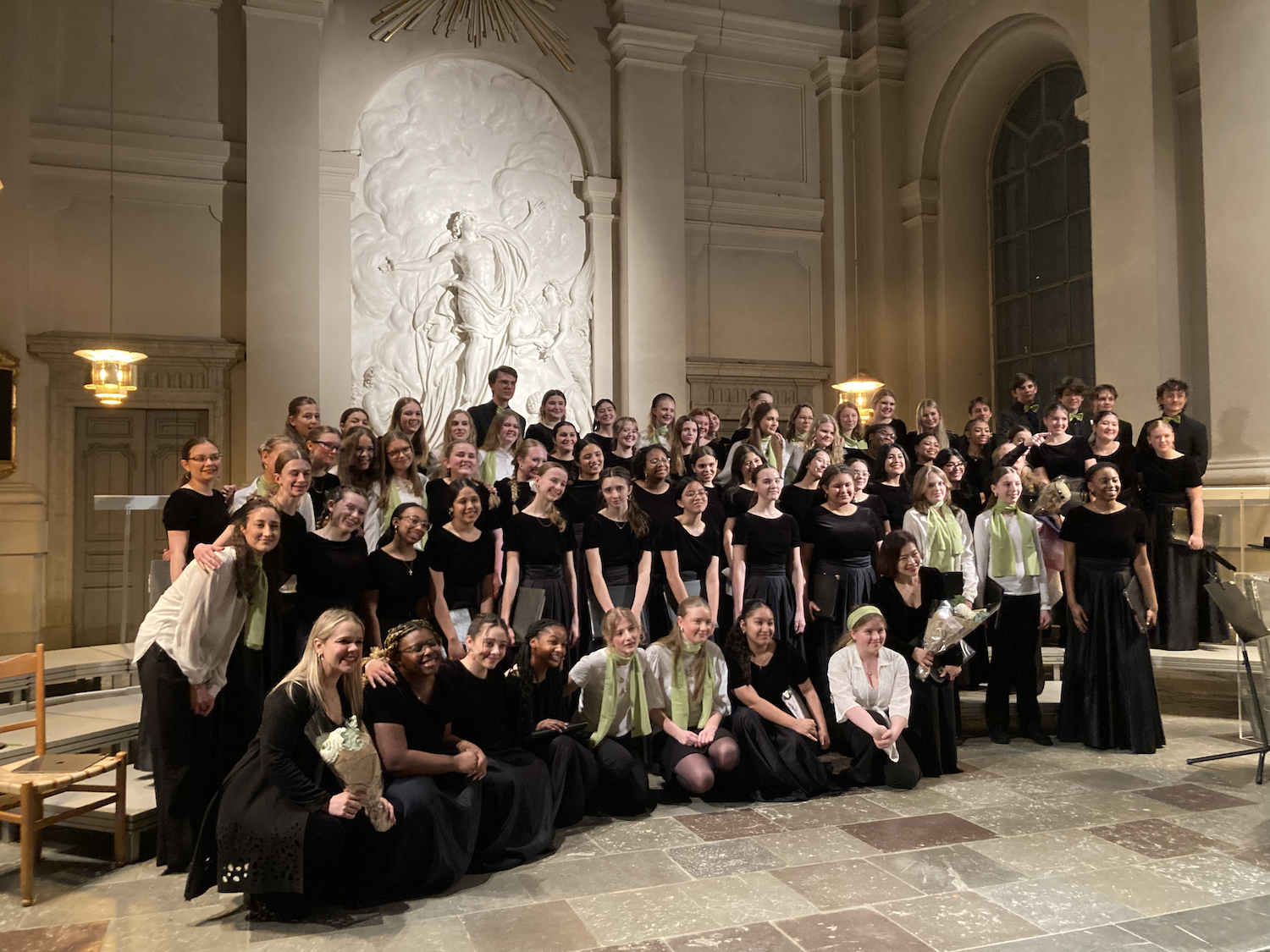Singing Girls of Texas with the green-scarved Adolf Fredriks Church Choir. Photo Credit: Till Meyn 