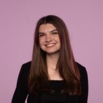 Headshot of senior Hailey Bogner against a pink backdrop