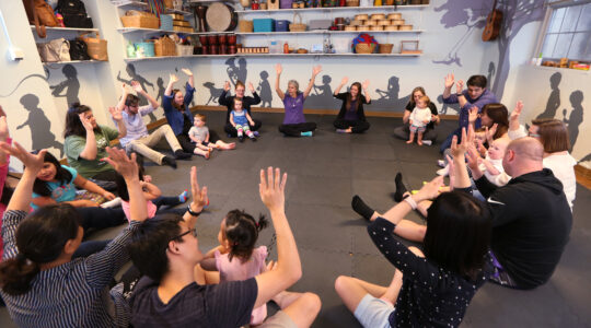 n the basement of Ed Landreth Hall, parents/caregivers and children participate in the Music Together "mixed ages" class, open to children 0-4 years old. The class is part of the Music Generations program.