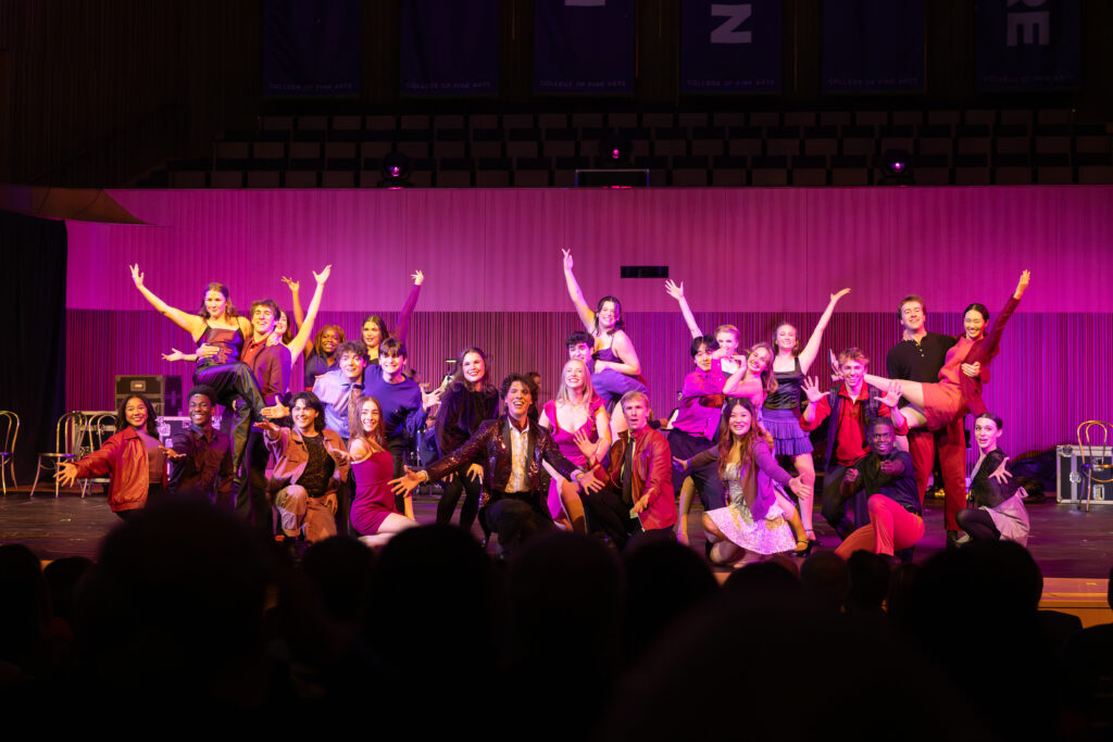 A group of theatre students performing on stage in the Van Cliburn Concert Hall at TCU for the 2025 Fine Arts Gala.