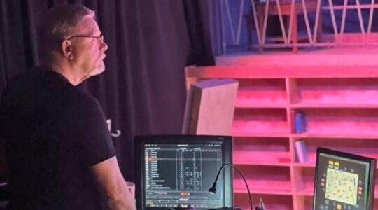 Michael Skinner at the lighting console
