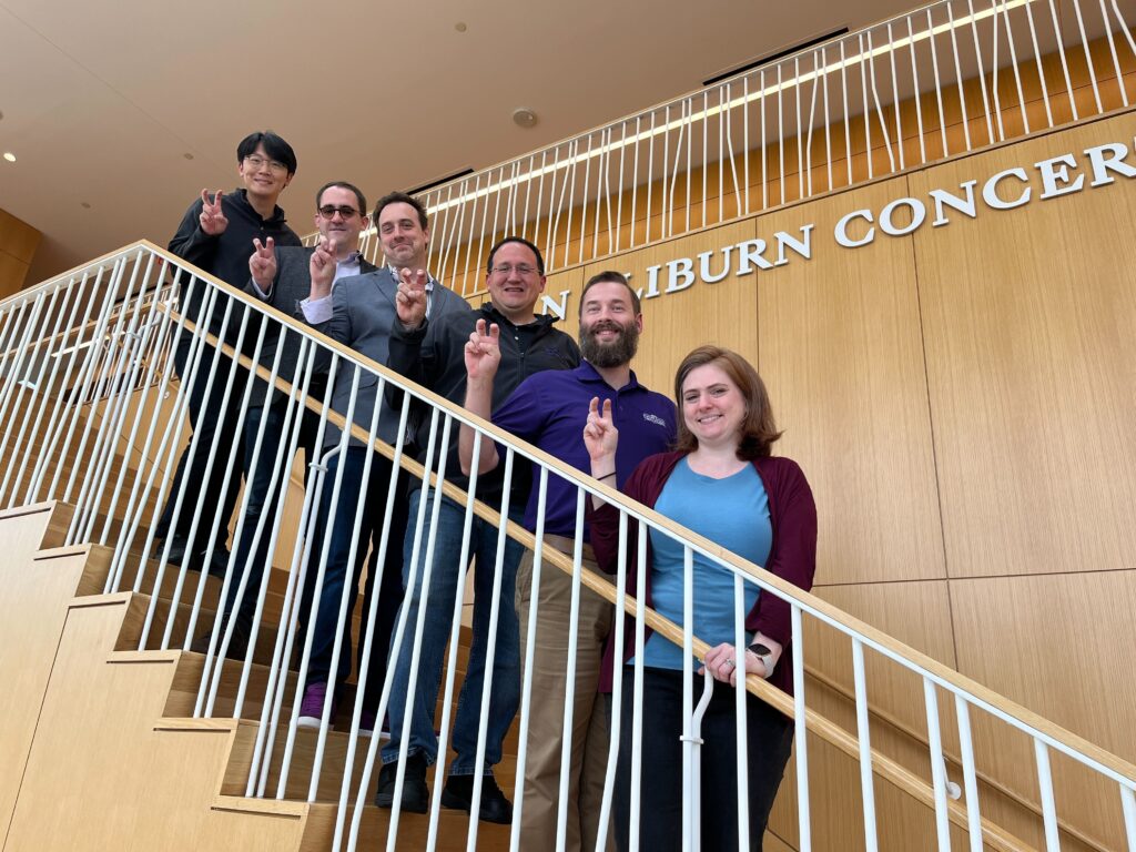 Group photo from right to left: Stephen Bates, Amanda Goodwin, Corey Hale, Chad Jung, Alex Moore, and SeungChan Lee on the stairs of the TCU Music Center.